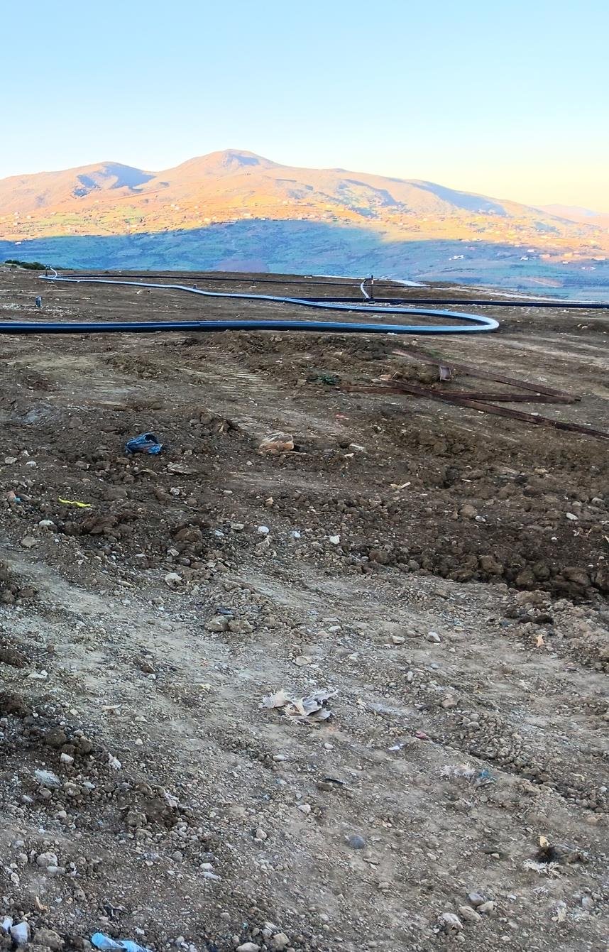 Landfill site in Morocco with mountainous landscape